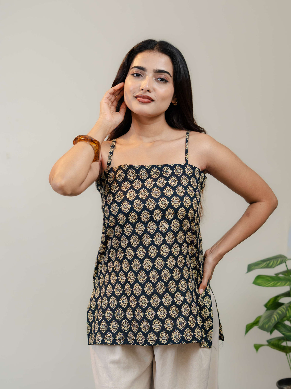 **Black Printed Sleeveless Kurti for Women with Square Neck & Lace-Up Back Design**