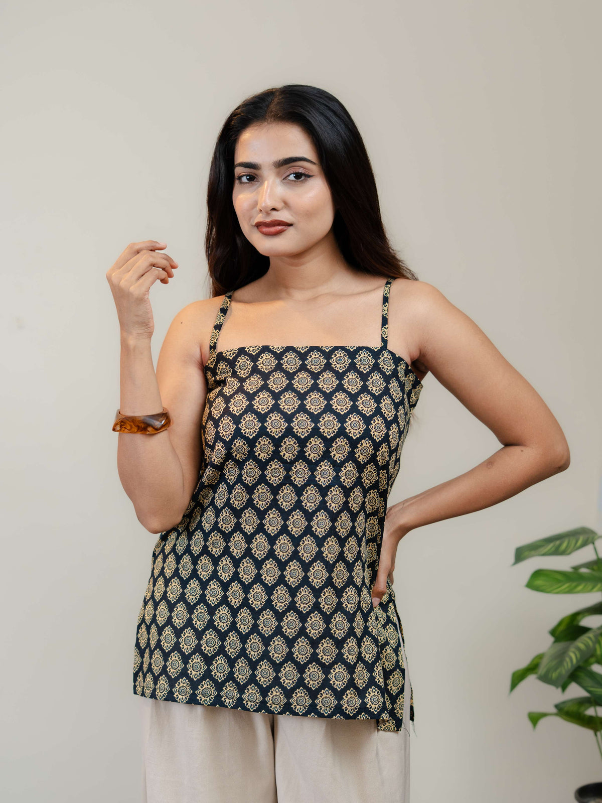 **Black Printed Sleeveless Kurti for Women with Square Neck & Lace-Up Back Design**