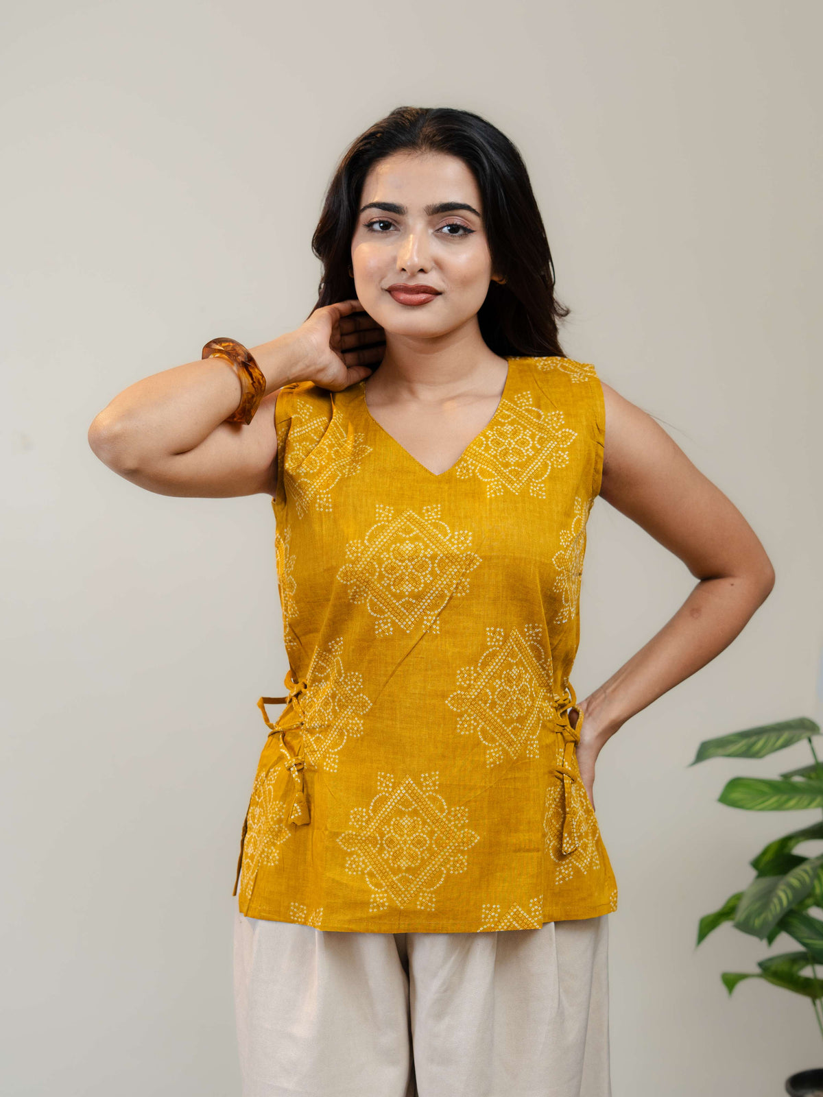 Mustard Yellow Sleeveless Kurti for Women with V-Neck & Side Tie-Up Detail