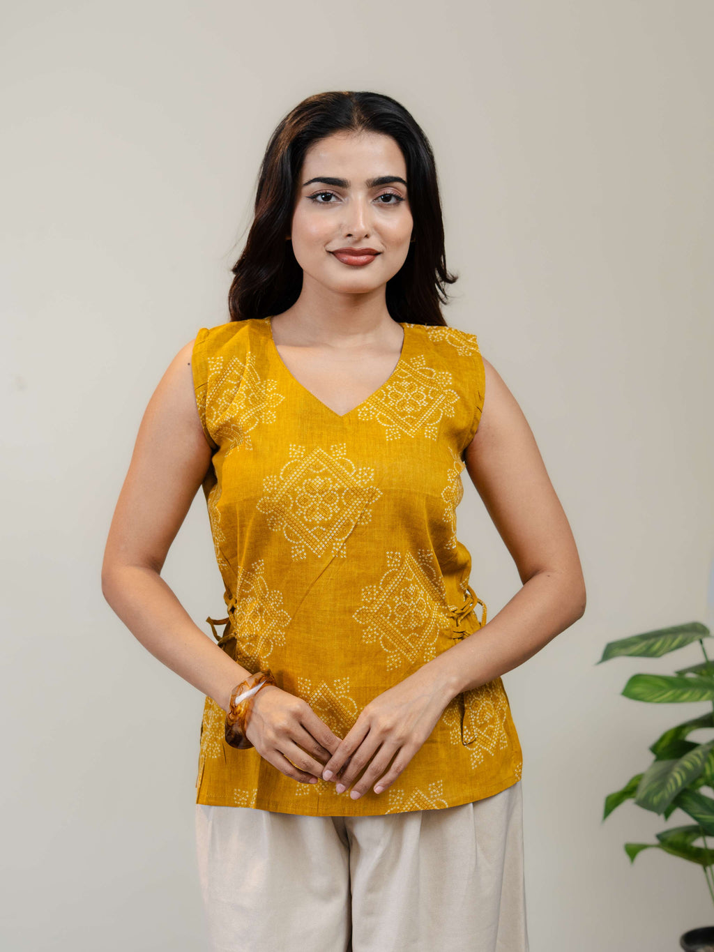 Mustard Yellow Sleeveless Kurti for Women with V-Neck & Side Tie-Up Detail