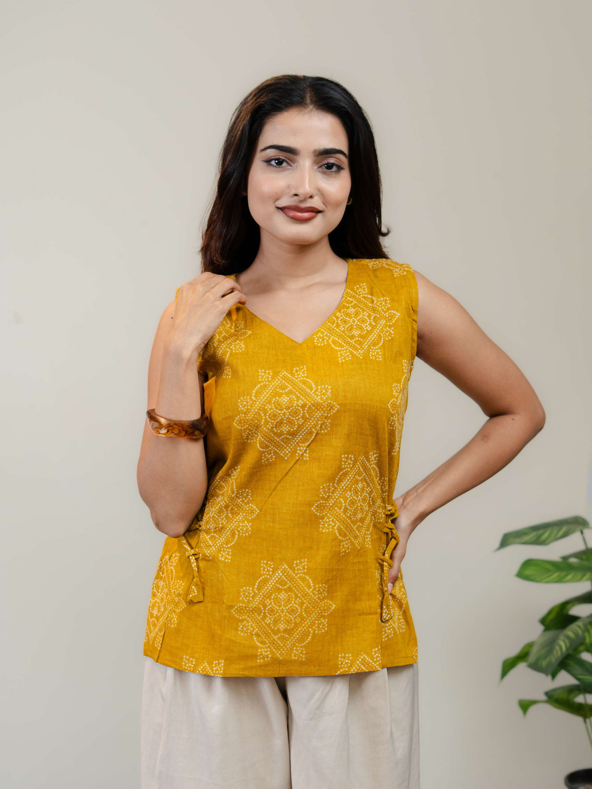 Mustard Yellow Sleeveless Kurti for Women with V-Neck & Side Tie-Up Detail