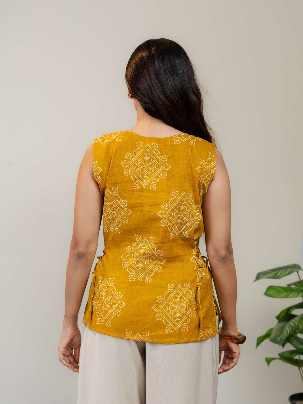 Mustard Yellow Sleeveless Kurti for Women with V-Neck & Side Tie-Up Detail