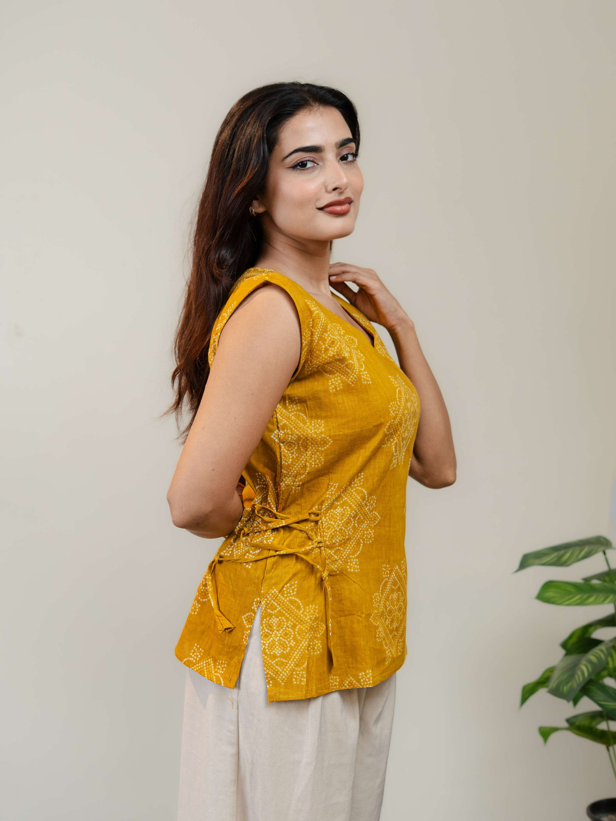 Mustard Yellow Sleeveless Kurti for Women with V-Neck & Side Tie-Up Detail
